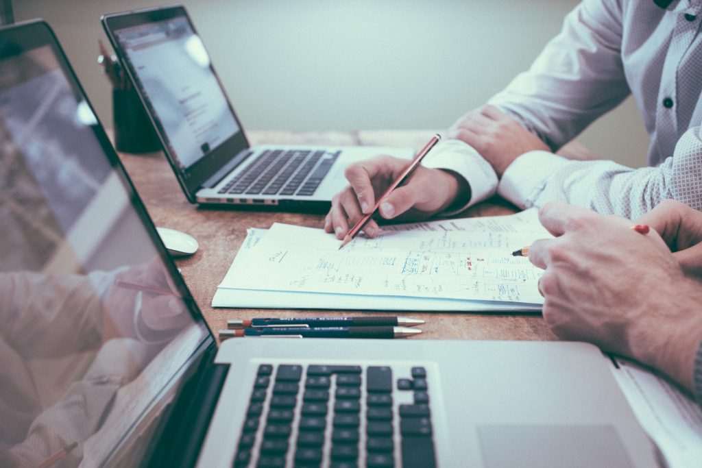 Person analyzing financial documents